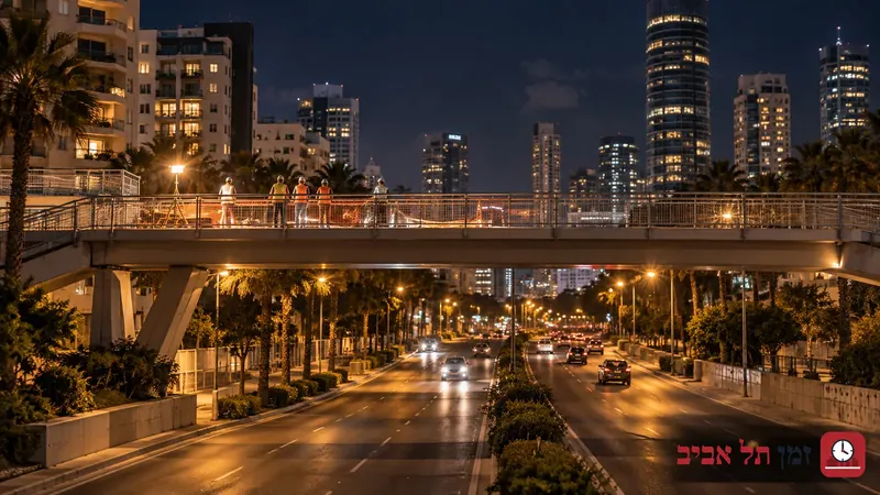 Generic pedestrian bridge over an urban road at night with work lighting, an illustrative scene
